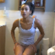 A pretty black girl takes a piss and a shit while sitting on a toilet. Audible, soft pooping sounds are heard, and she complains about the smell. She stands up to wipe her ass. Slower frame rate video. Presented in 720P HD. Over 5.5 minutes.
